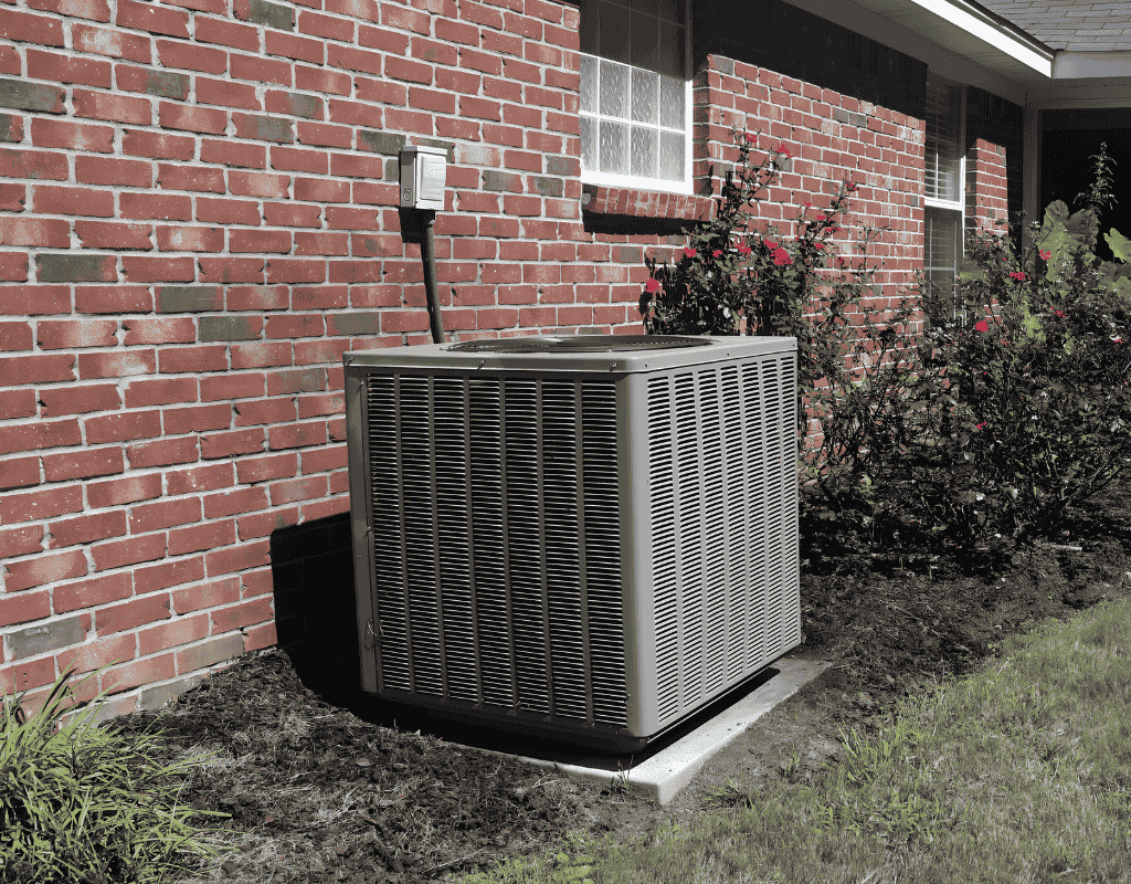 outdoor air conditioning unit installed next to brick home in Columbia MO